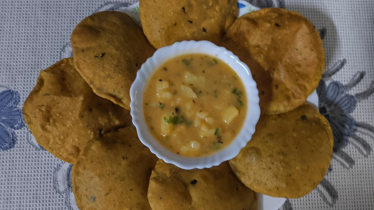 Healthy N Tasty Kitchen is chana dal masala puri and alur sabji
