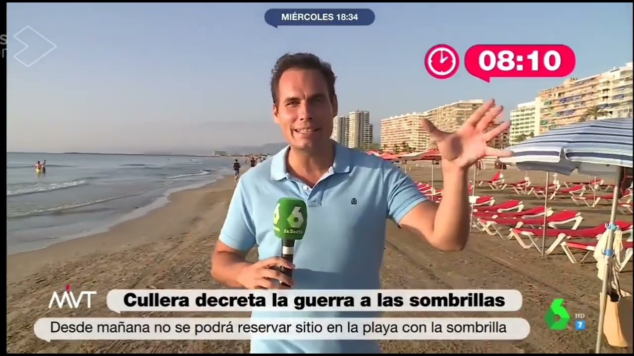 Madrugando con nuestra sombrilla a la playa