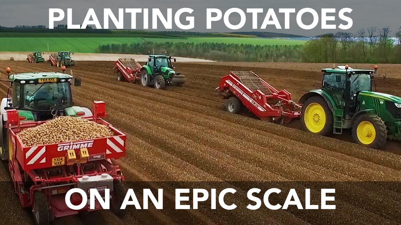 Six John Deere Tractors - Planting Potatoes