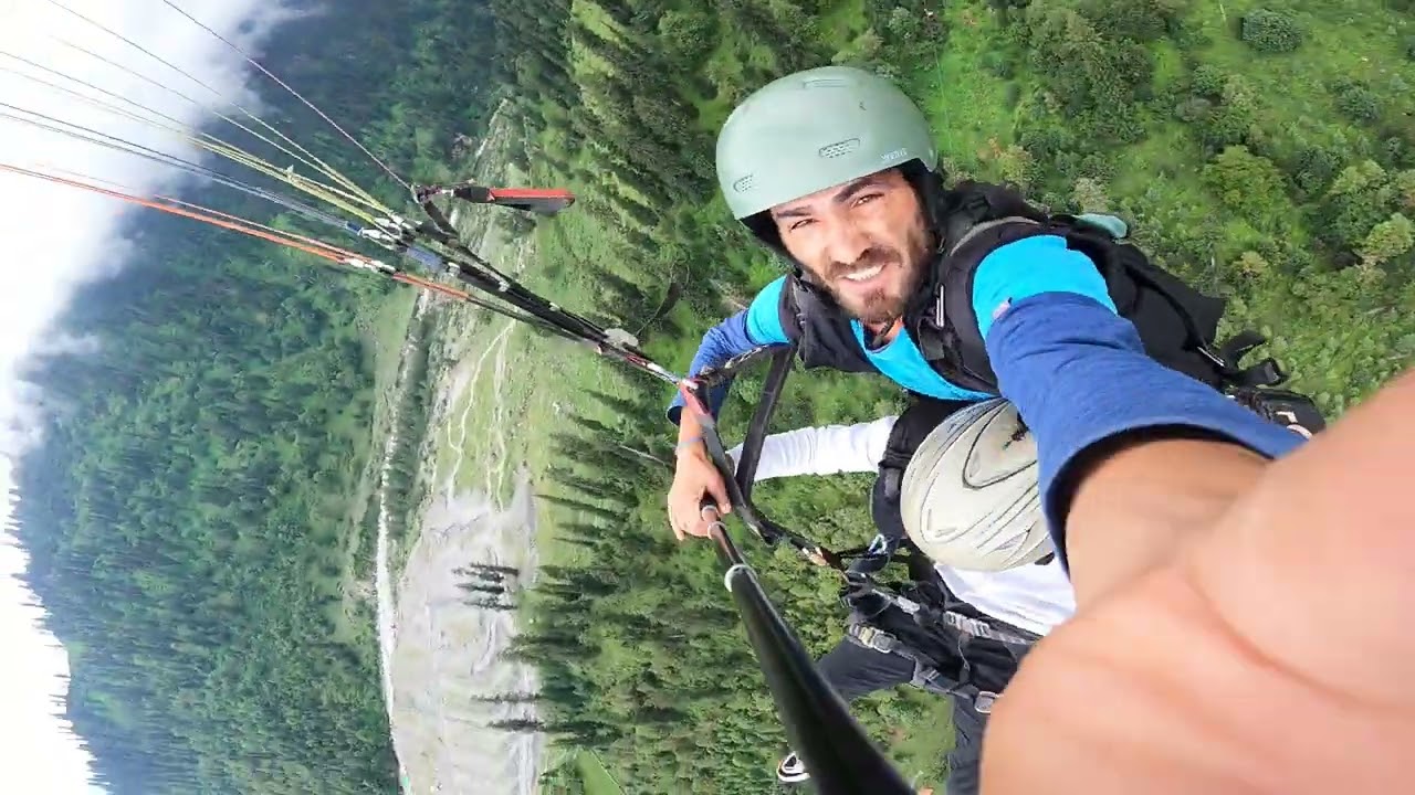 Capturing the essence of freedom as I glide above the world #paraglidingpilot #embrace Wind#flyhigh