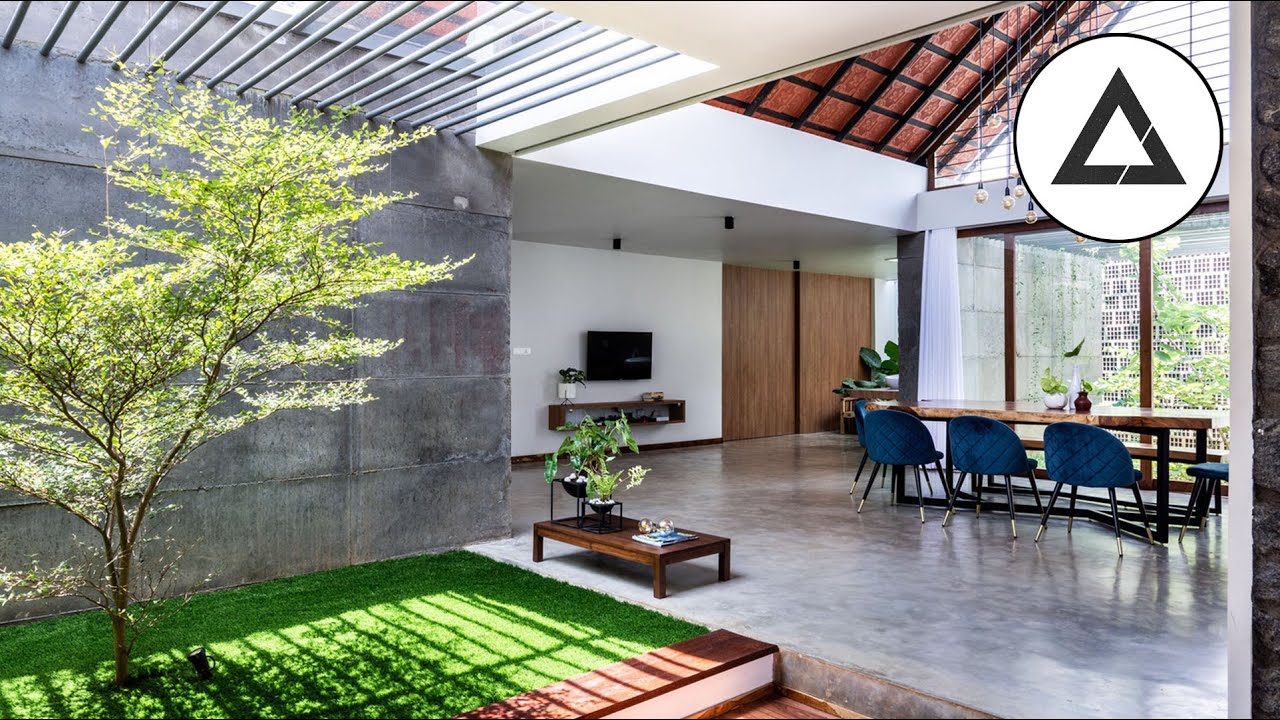 'CAER' Modern Tropical House In Mampad With Indoor Greenery