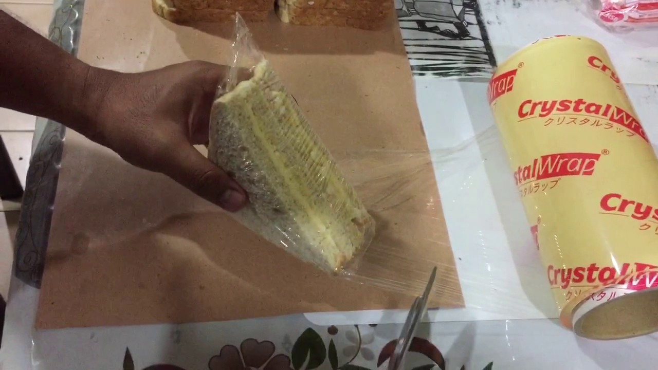 Fastest and easiest way how to wrap a sandwich using a plastic wrapper/ bungkus sandwich