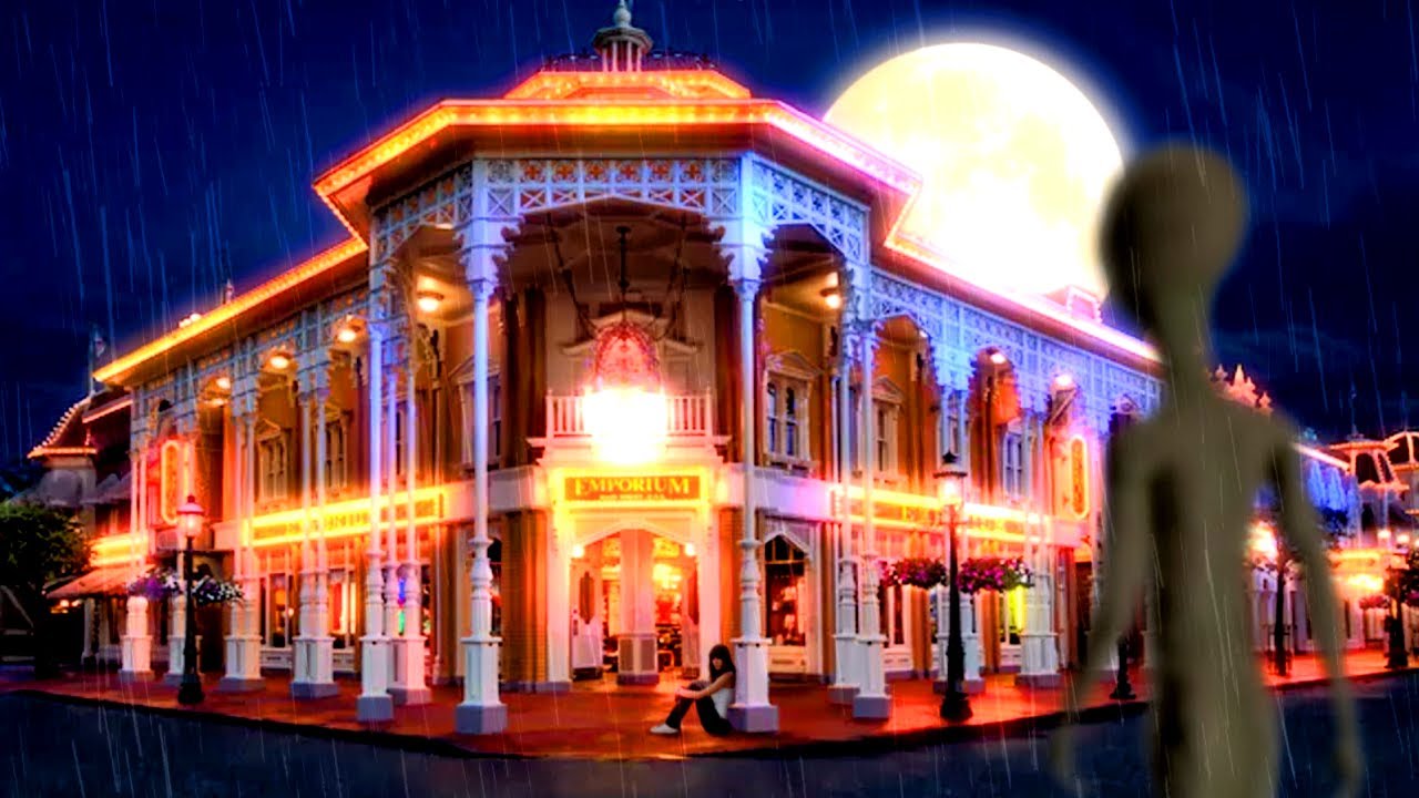 Main Street music is playing somewhere from far but it's raining, you sit under the Emporium