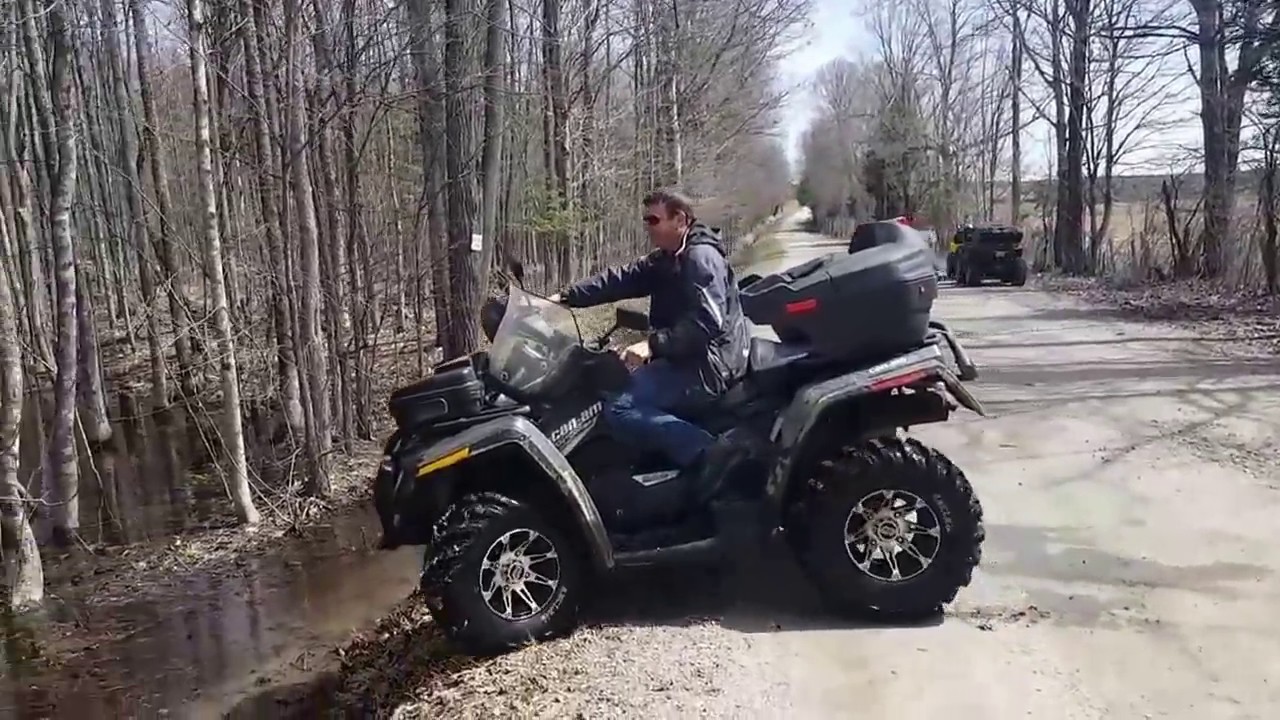 Can am outlander xt 650 in the goo!  Ancla 27s