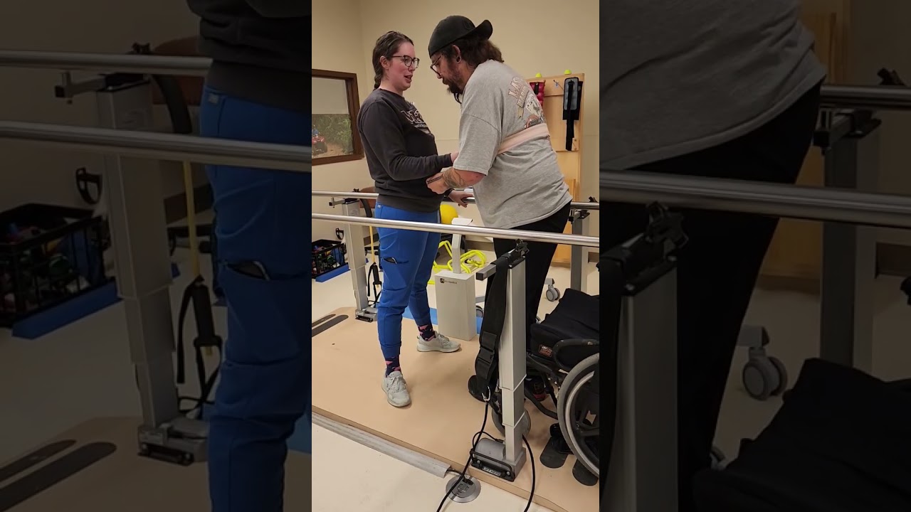 Parallel bars  forward and backwards  pt with Emily 2/11/26