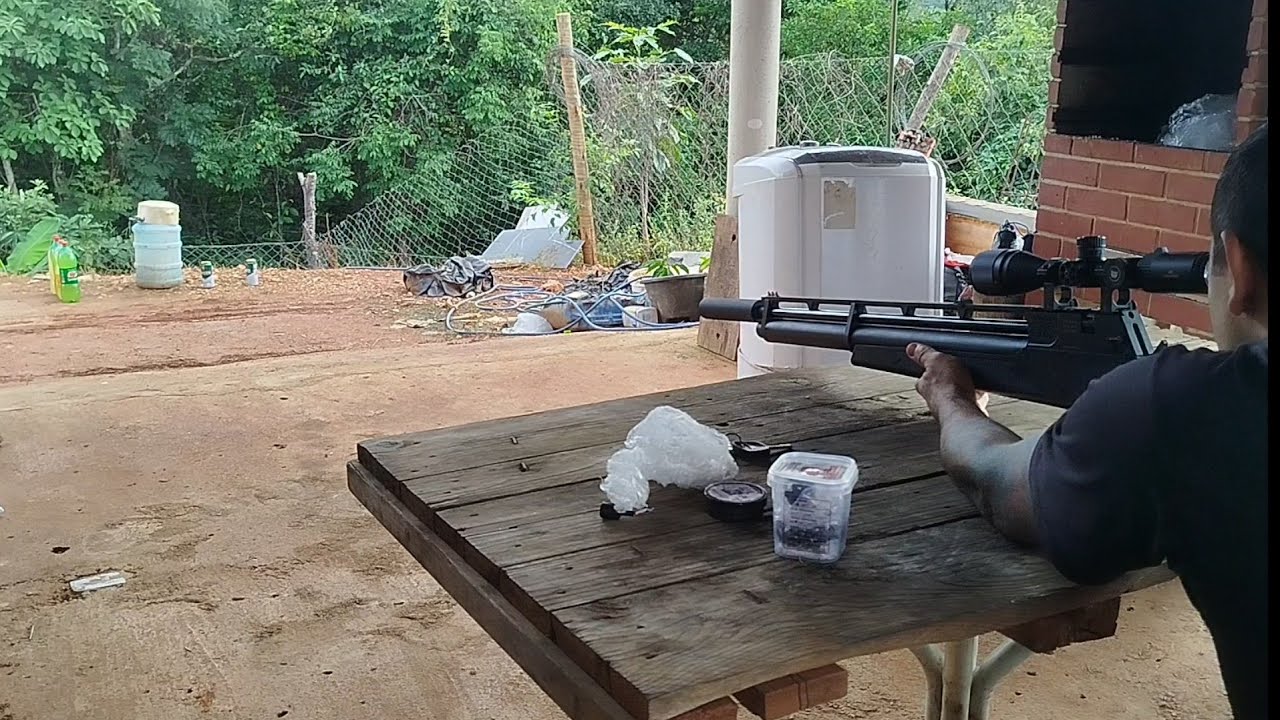 Teste de pot&ecirc;ncia com carabina de press&atilde;o PCP R8 6.35, penela , garrafas pets .