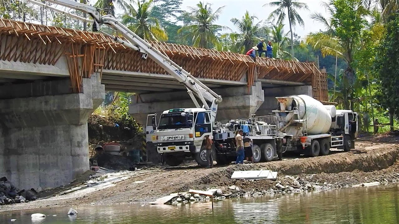 Excavators Ready Mix Concrete Cement Pump Trucks Working on The Bridge Construction