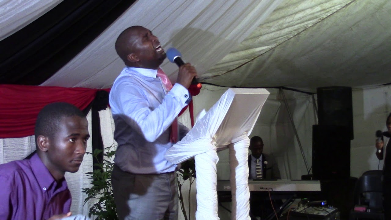 BISHOP N.E. BUTHELEZI 