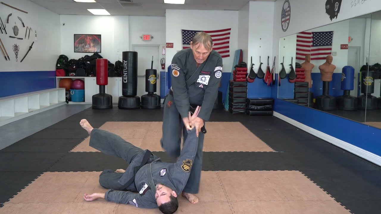 Executing the American Kenpo technique Tripping Arrow
