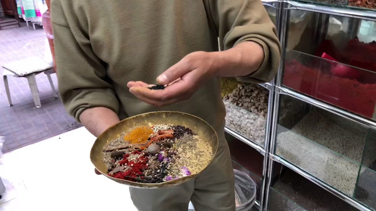 Making fresh Ras-el-Hanout in spice shop, Marrakech, Morocco