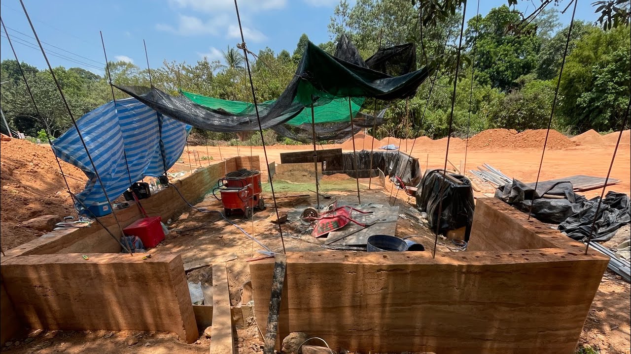 Building a rammed Earth house in Thailand