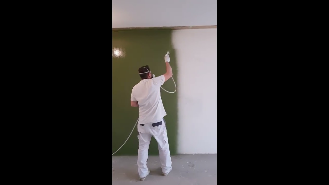 Woonkamer muur in de kleur Mos 6020 G50Y van Histor gespoten