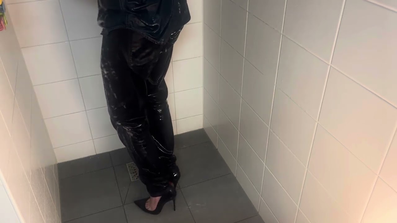 Wetlook wearing denim and louboutins 👖👠🚿
