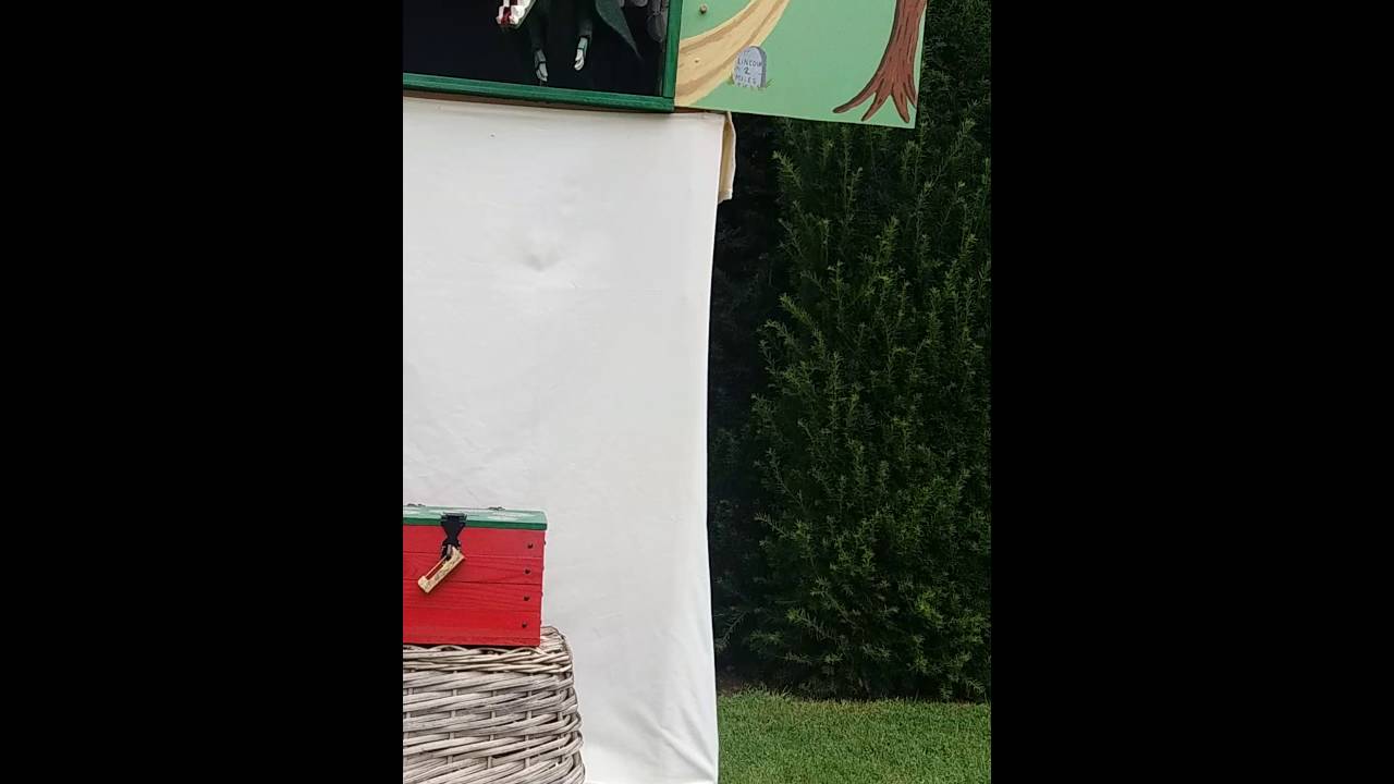 Medieval puppet show. St George and the Dragon.