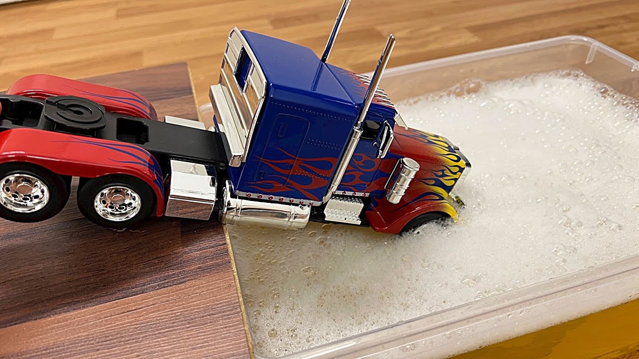 Cool Diecast Model Cars Sliding Into The Water And Foam