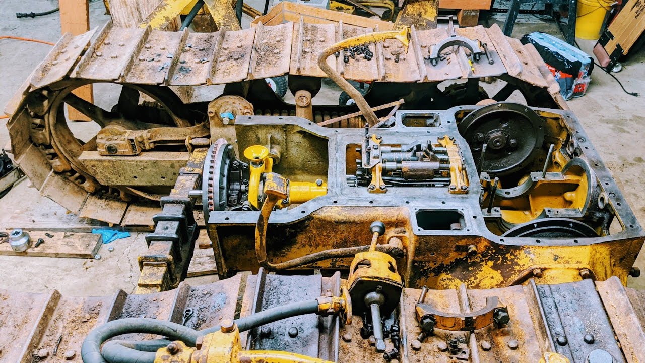 Caterpillar D4 transmission repair and clutch installation