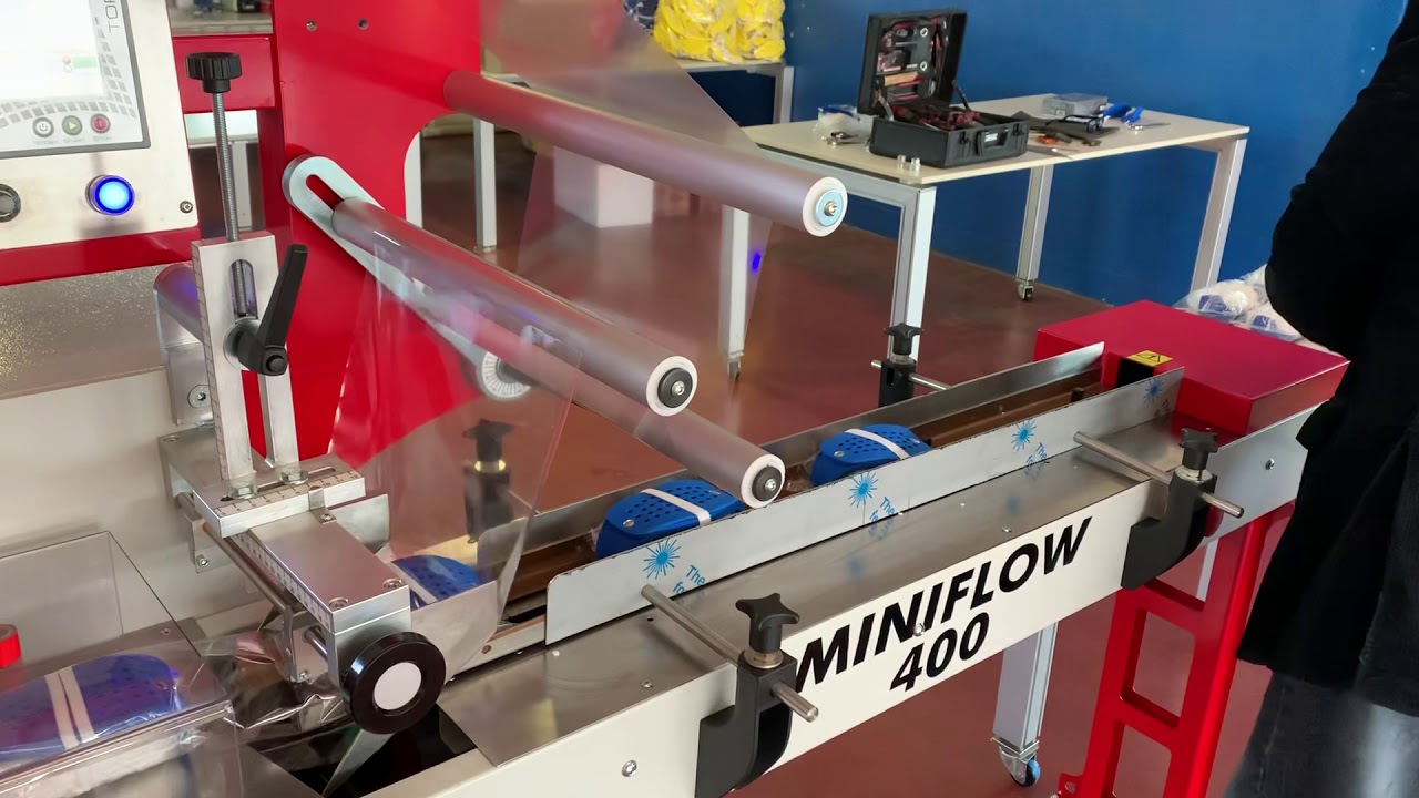Confezionatrice flowpack Miniflow 400 - confezionamento mascherine protettive