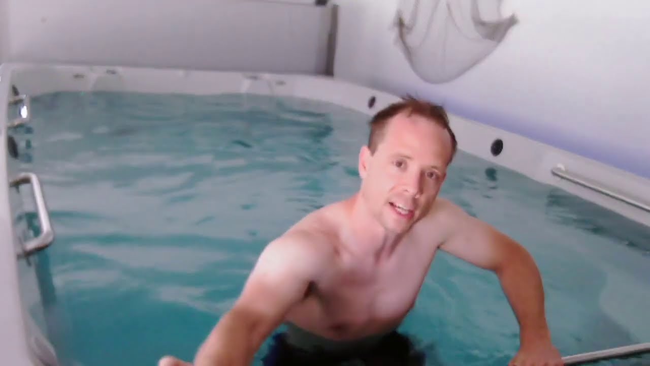 Endless Pool E-550 in garage (2 of 6) - Underwater treadmill, sound system, and massage jets.
