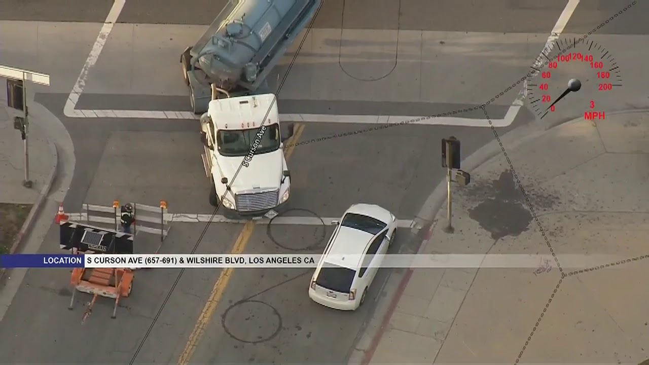Police chase stolen tanker truck carrying 2,000 gallons of unknown liquid in Mid-Wilshire area of LA