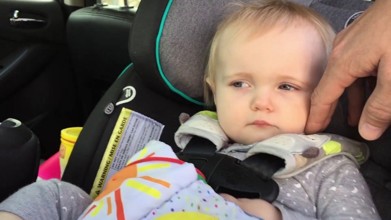 Try not to laugh. Baby pretending to sleep.