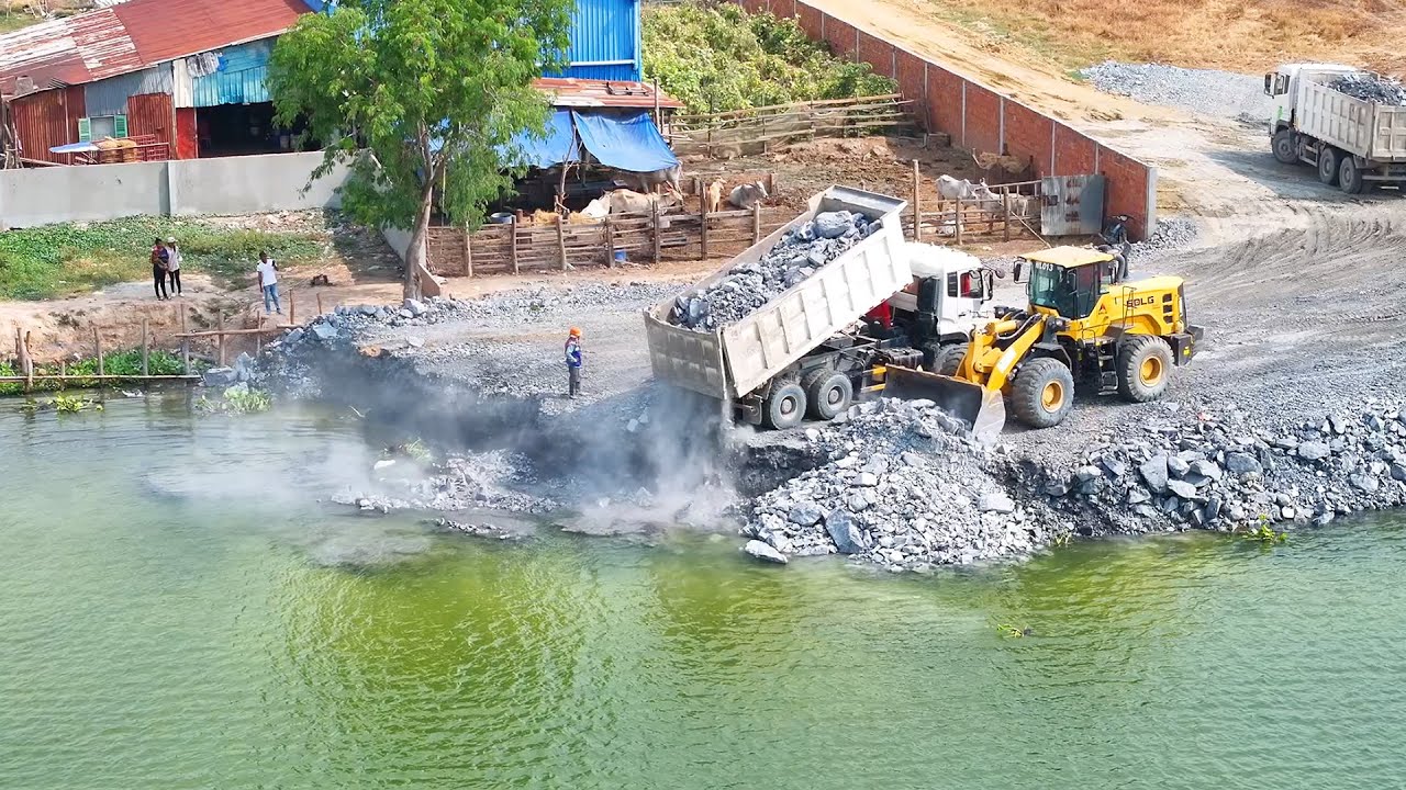 OMG !!The Big Land Slide Shantui Bulldozer Pushing Stones Into Water Deep With 25T Dump Trucks