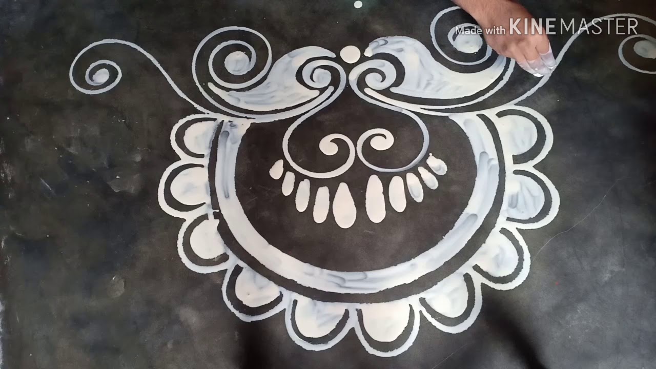 Very innovative Laxmi pa alpona design for Laxmi puja /mukesh arts