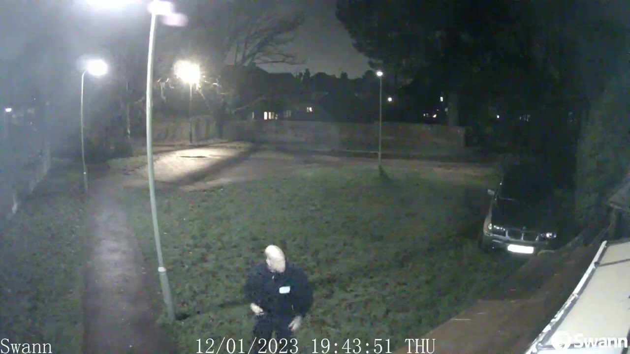Another police officer taking photos of my side window and house. It's not write  ?