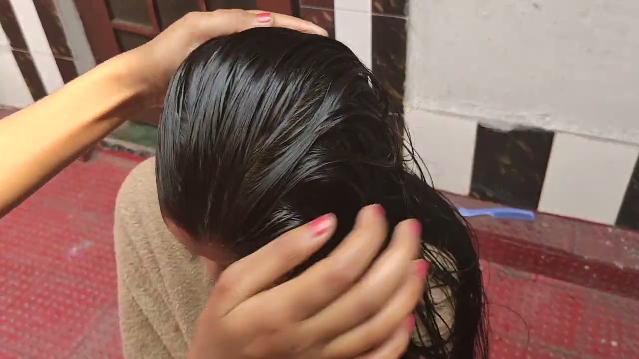 Heavily oiled wet hair combing by friend wet hair combing oiled hair combing sleek hair combing