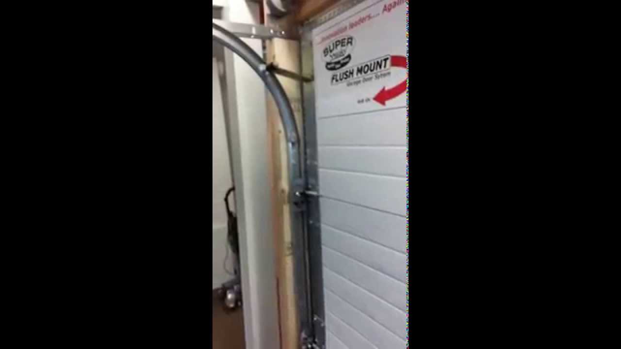 super sneaky flushmount garage door trade booth product launch