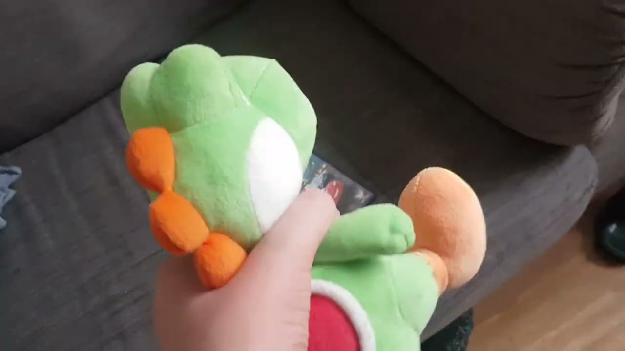 Yoshi watches the 9 logo
