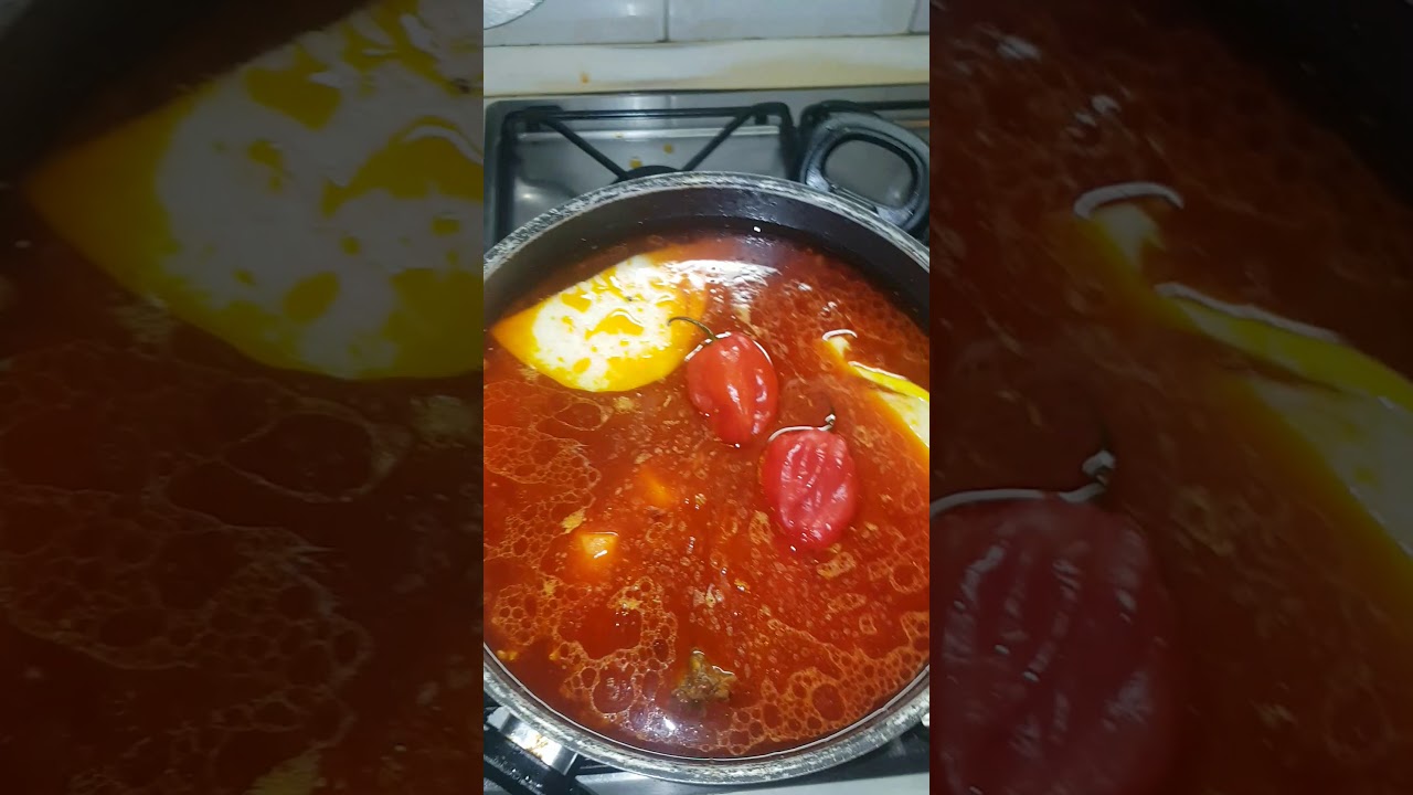 Preparazione Thiebou Jeen ,riso pesce ( rosso) piatto senegalese