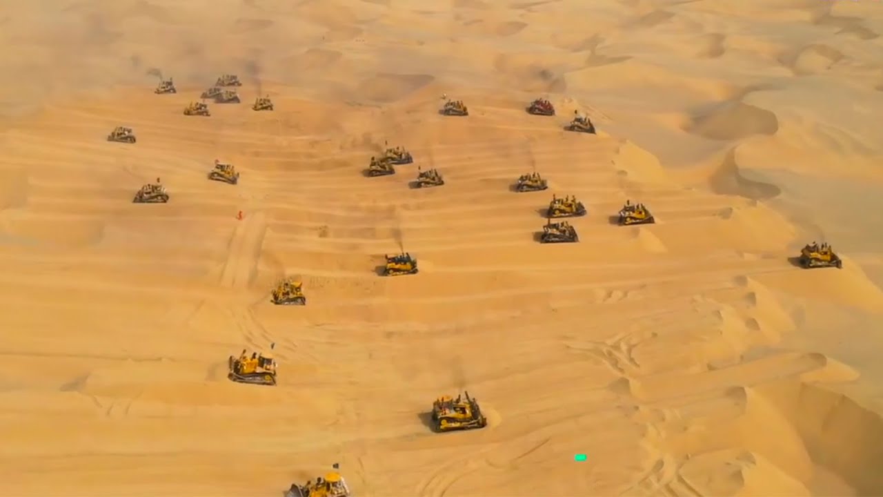 New highway under construction in China's largest desert