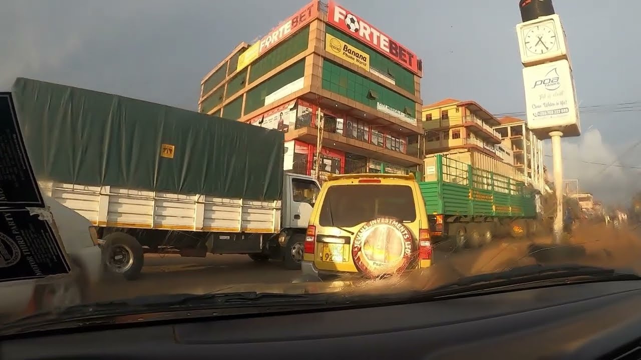 Real Uganda around Mukono, Seeta, and Kampala area viewed as a car passenger February 2022