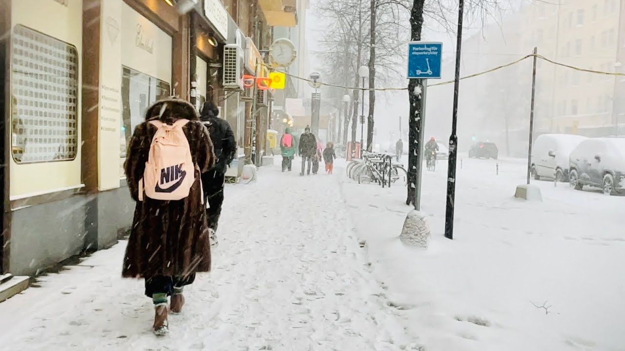 Swedish spring weather. Stockholm walk in snow storm (Södermalm)