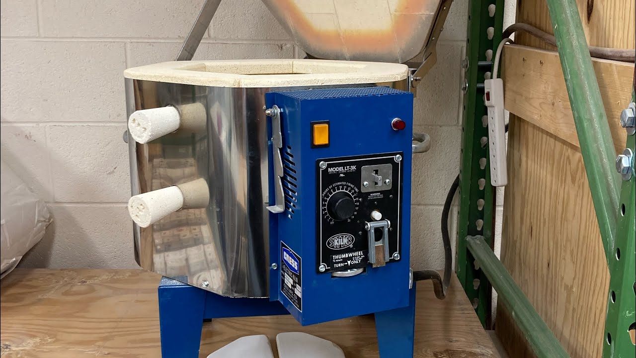 Firing Dr. Fauci (Cress cone sitter test kiln at IUS Ceramics)