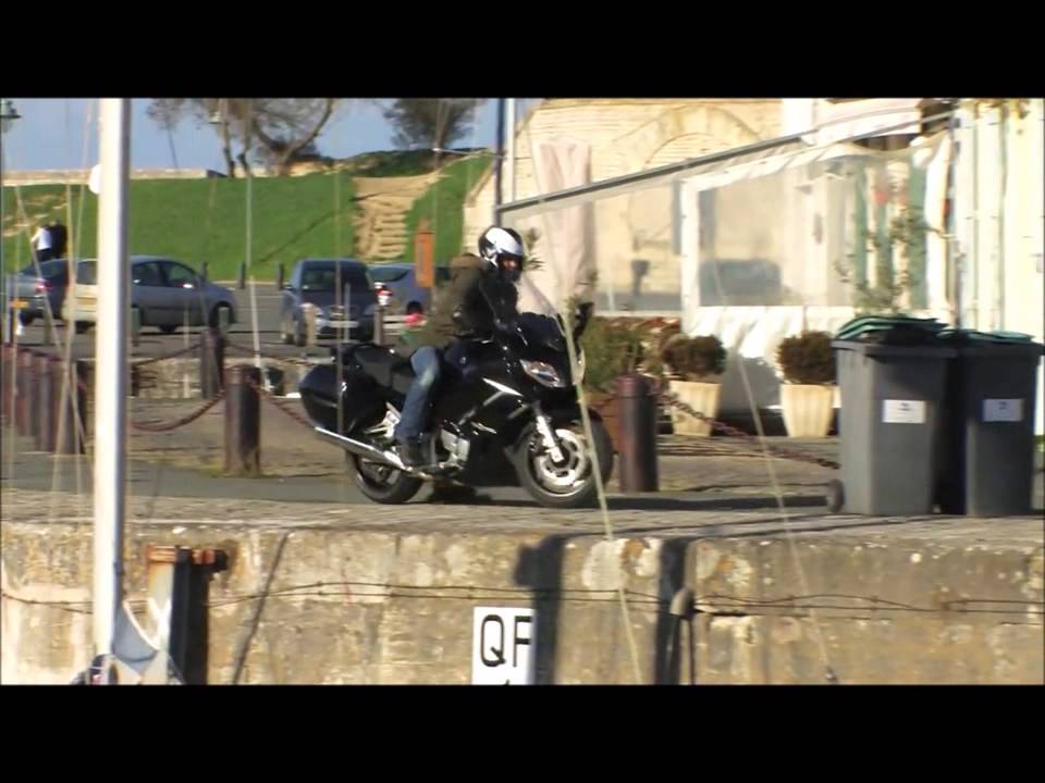 Motorbike crashes into boat - literally. Epic fail!