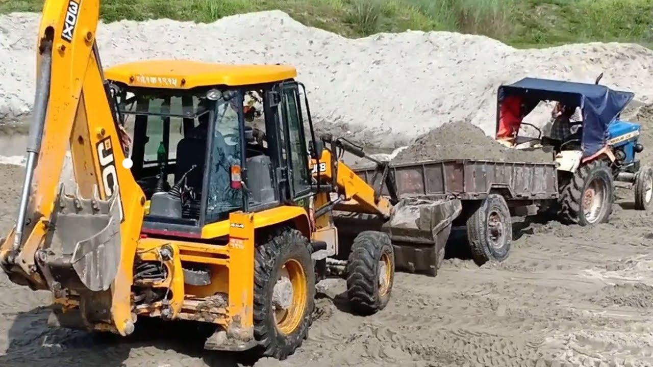 JCB Backhoe Rescues Loaded Trapped Tractor