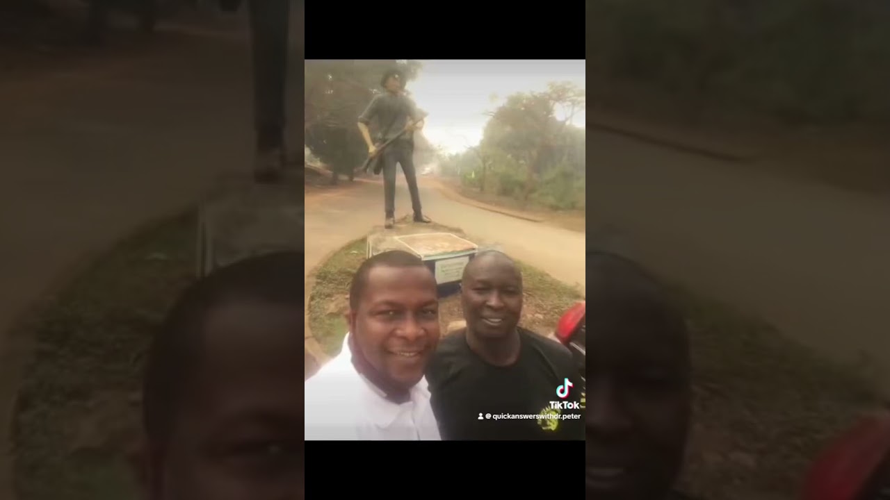 Dr. Peter NGANJE at Ikom passing the hanging bridge