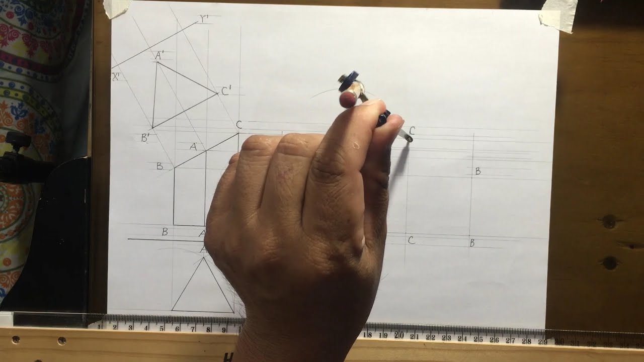 Surface Development of a Triangular Prism  Truncated