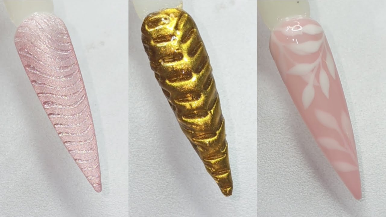 embossed chrome nail art ,3d illusion cat eye nail art design and cute leaves nail art