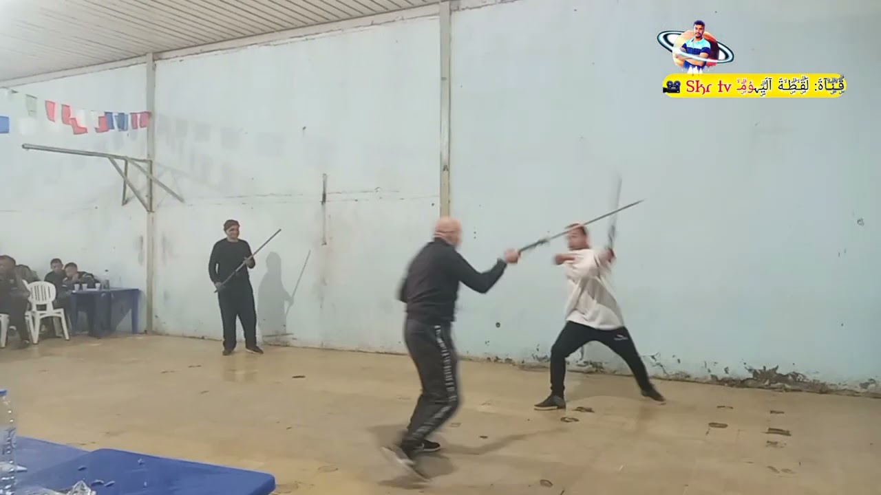مطرق مع شيخ الحاج تاع أم طبول #العصا_التقليدية #الجزائر Stick_fight#