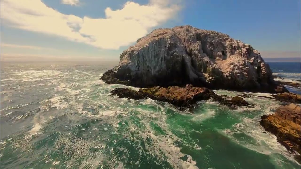 Vuelo sobre el Peñón Peña Blanca, El Canelillo, Algarrobo, V región de Chile