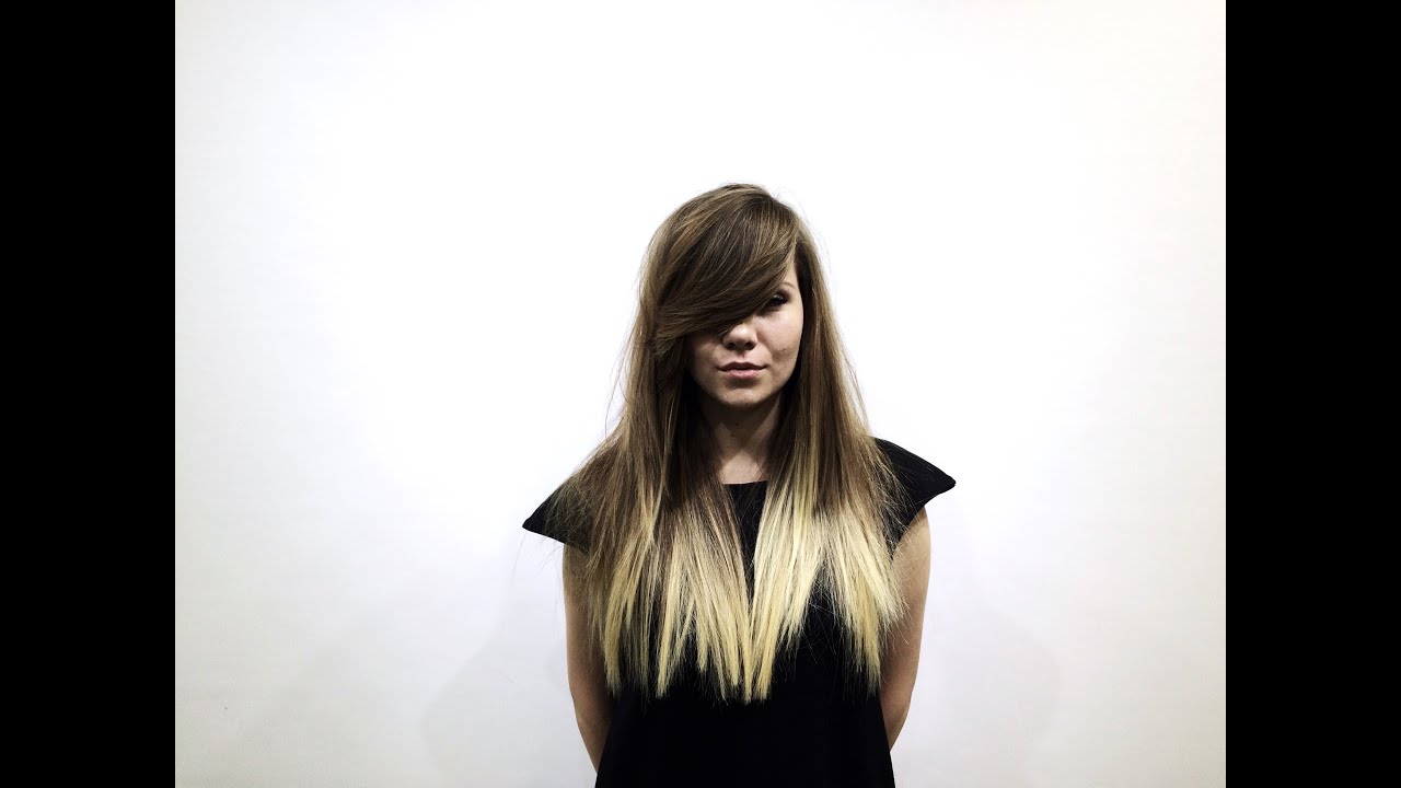 long haircut with layers tutorial, heavy asymmetrical fringe