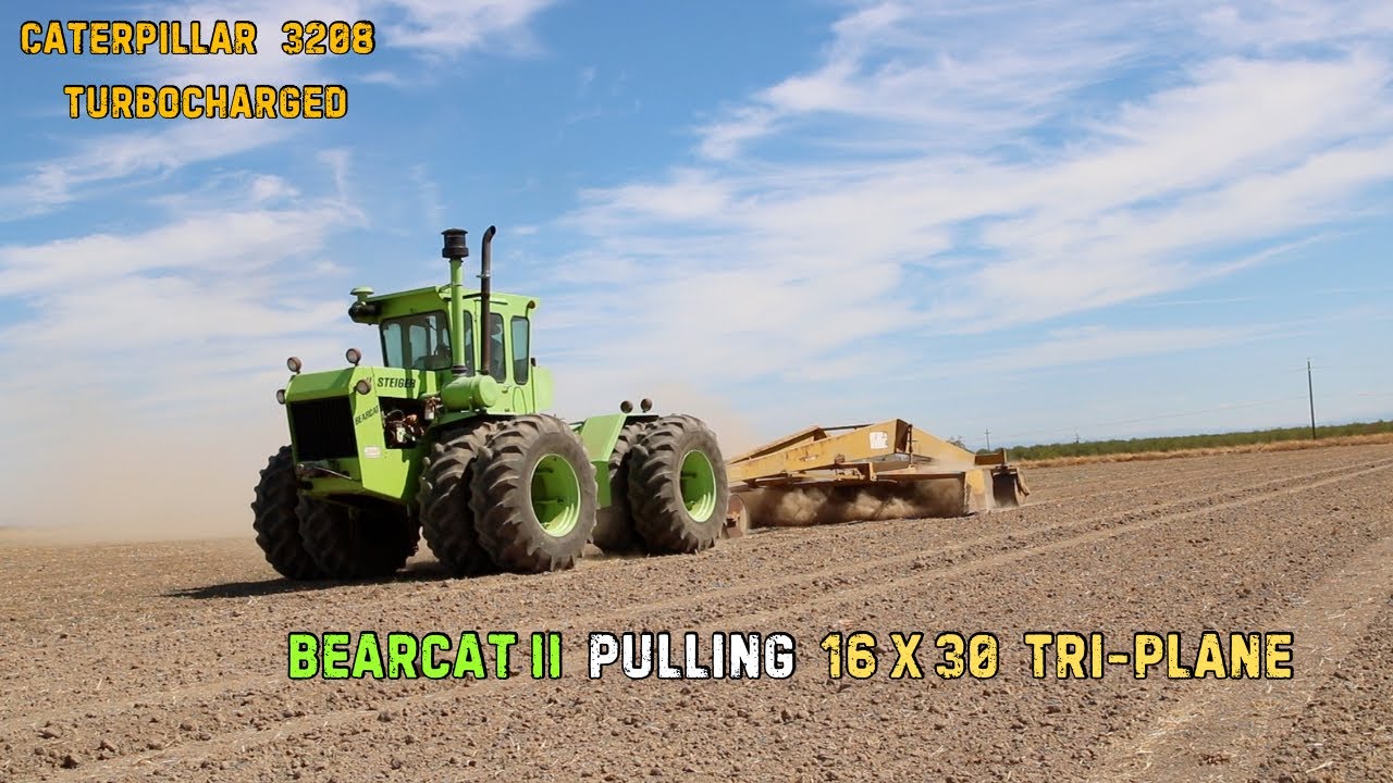 Steiger Bearcat II pulling a Marvin 16 X 30 Tri-Plane
