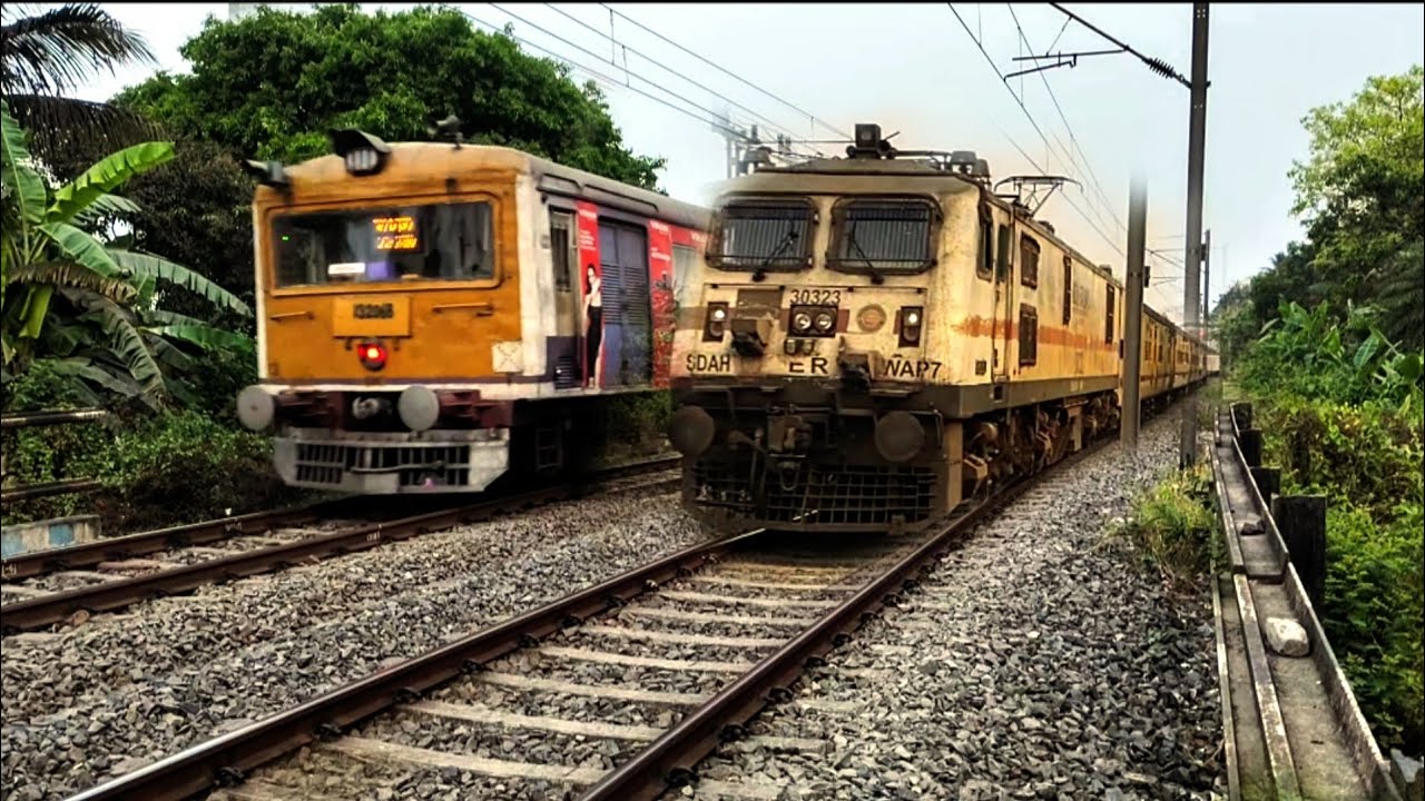🔥Indian Railway high speed train WAP7 VS ICF Medha passing railgate Road 🚊