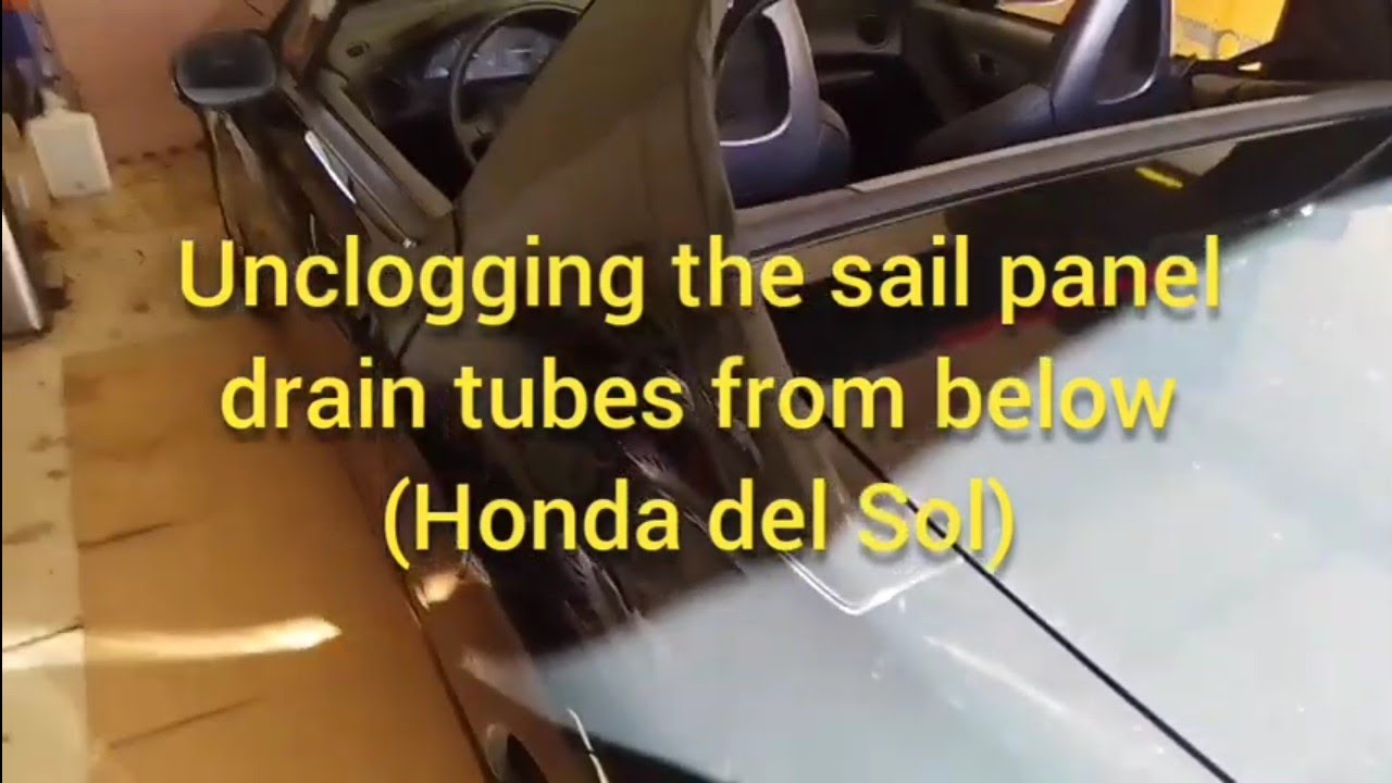 Honda del Sol sail panel drain tube unclogging (from underneath)
