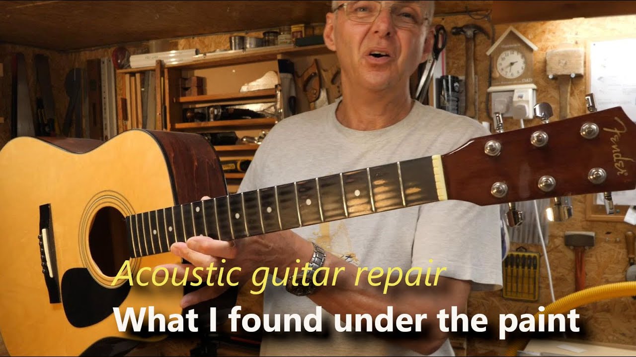 Amateur luthier finds a surprise under painted fretboard.