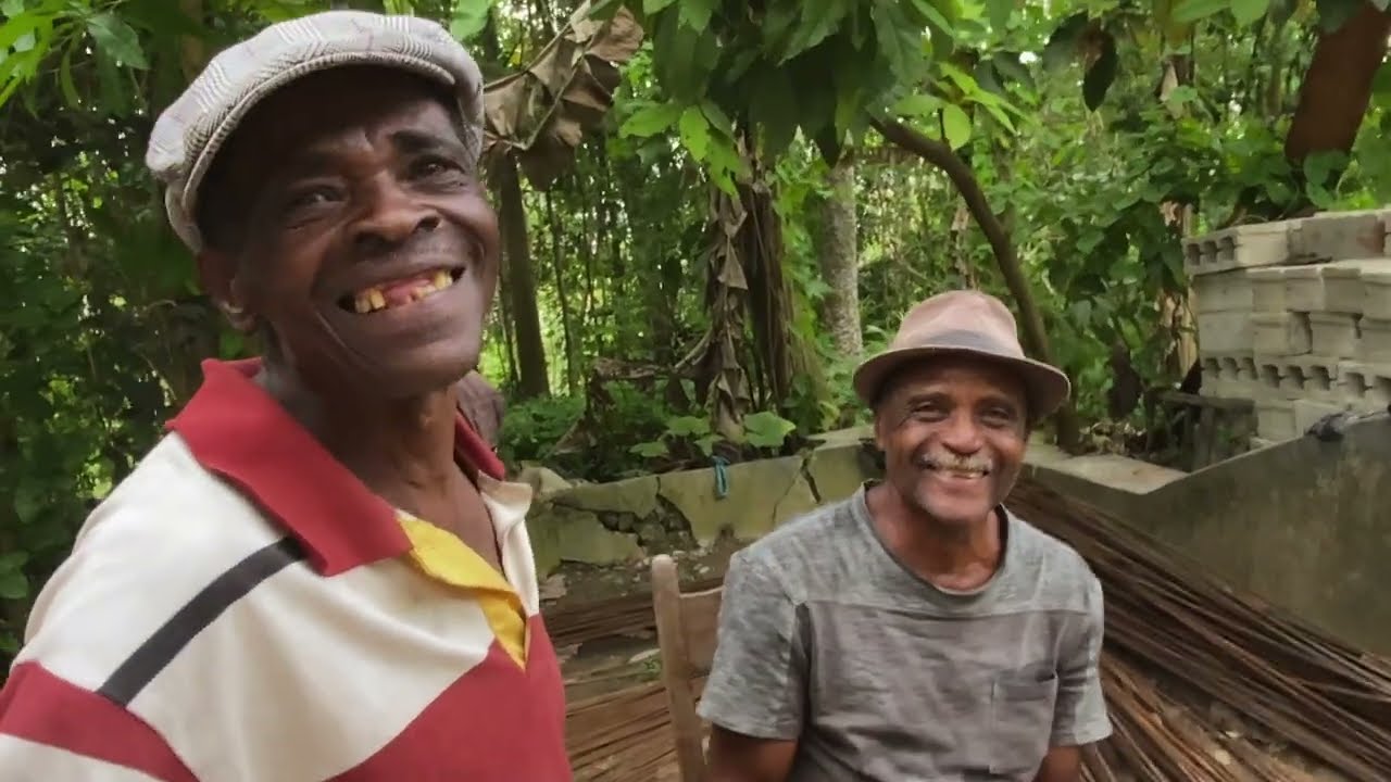Yon Ayisyen Imigrasyon depòte Ayiti ki al travay tè andeyò.