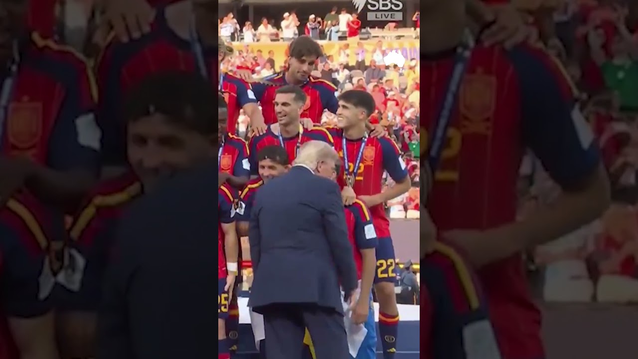 Donald Trump booed after refusing to leave stage during Spain's World Cup trophy presentation