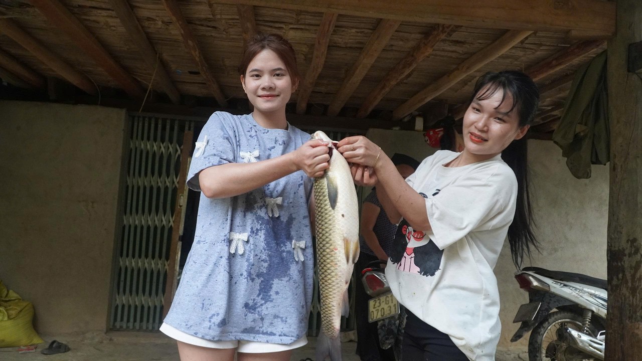 Pretty country girl catches fish for dinner.